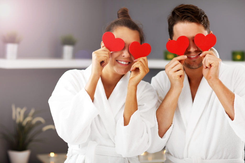 Picture of adult happy couple relaxing in spa salon